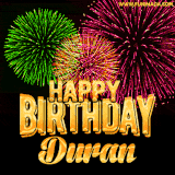 A captivating GIF with bursts of green, pink, and orange fireworks lighting up the night sky, accompanied by 'Happy Birthday Duran' in glowing golden text.