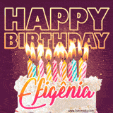 A colorful birthday cake topped with lit candles, with the words 'Happy Birthday Efigênia' in bold glowing letters on a burgundy background. Animated flames add a festive touch.