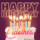 A colorful birthday cake topped with lit candles, with the words 'Happy Birthday Eidothea' in bold glowing letters on a burgundy background. Animated flames add a festive touch.