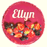 Beautifully decorated red velvet berry birthday cake with vibrant fruits and a glowing 'Ellyn' name, adding a touch of sweetness and sparkle.