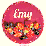 Beautifully decorated red velvet berry birthday cake with vibrant fruits and a glowing 'Emy' name, adding a touch of sweetness and sparkle.