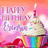 A vibrant birthday GIF featuring a rainbow-colored cupcake topped with white frosting, sprinkles, and a lit candle. The text reads 'Happy Birthday Erensia' in bold pink and violet letters with white outline.
