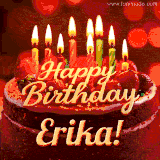Beautifully decorated red velvet berry birthday cake with vibrant fruits and a glowing 'Erika' name, adding a touch of sweetness and sparkle.