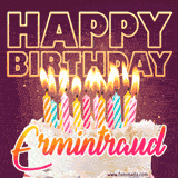 A colorful birthday cake topped with lit candles, with the words 'Happy Birthday Ermintraud' in bold glowing letters on a burgundy background. Animated flames add a festive touch.