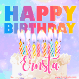 A vibrant animated name GIF with the words 'Happy Birthday Ernsta' with colorful candles on a creamy cake. The background sparkles with pastel shades, adding a festive touch.
