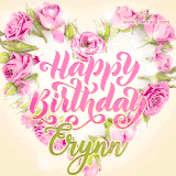 A stunning heart made of pink roses surrounds the elegant script text 'Happy Birthday Erynn' on a soft beige background. Animated sparkles add a magical and festive feel.
