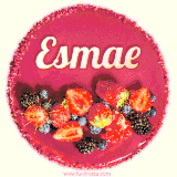 Beautifully decorated red velvet berry birthday cake with vibrant fruits and a glowing 'Esmae' name, adding a touch of sweetness and sparkle.