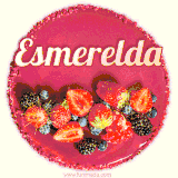 Beautifully decorated red velvet berry birthday cake with vibrant fruits and a glowing 'Esmerelda' name, adding a touch of sweetness and sparkle.