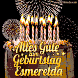 A chocolate birthday cake with glowing candles, the German text 'Alles Gute zum Geburtstag Esmerelda,' and vibrant fireworks lighting up the background in an animated GIF.