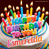 A colorful birthday cake topped with lit candles, with the words 'Happy Birthday Esmerelda' in bold glowing letters on a burgundy background. Animated flames add a festive touch.