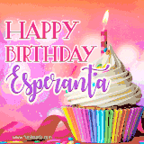 A vibrant birthday GIF featuring a rainbow-colored cupcake topped with white frosting, sprinkles, and a lit candle. The text reads 'Happy Birthday Esperanta' in bold pink and violet letters with white outline.