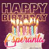 A colorful birthday cake topped with lit candles, with the words 'Happy Birthday Esperanta' in bold glowing letters on a burgundy background. Animated flames add a festive touch.