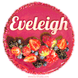 Beautifully decorated red velvet berry birthday cake with vibrant fruits and a glowing 'Eveleigh' name, adding a touch of sweetness and sparkle.