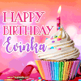 A vibrant birthday GIF featuring a rainbow-colored cupcake topped with white frosting, sprinkles, and a lit candle. The text reads 'Happy Birthday Evinka' in bold pink and violet letters with white outline.