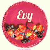 Beautifully decorated red velvet berry birthday cake with vibrant fruits and a glowing 'Evy' name, adding a touch of sweetness and sparkle.