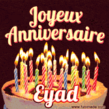 A Happy Birthday GIF in French featuring a festive birthday cake adorned with bright candles and the glowing text 'Joyeux Anniversaire Eyad' in a cheerful style.