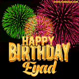 A captivating GIF with bursts of green, pink, and orange fireworks lighting up the night sky, accompanied by 'Happy Birthday Eyad' in glowing golden text.