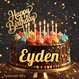 Elegant yellow script spelling Eyden on a chocolate glaze birthday cake with glowing multicolored candles.