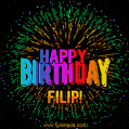 A colorful animated GIF featuring the text 'Happy Birthday Filip!' in rainbow colors with a dynamic iridescent firework display in the background.
