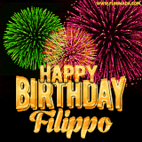 A captivating GIF with bursts of green, pink, and orange fireworks lighting up the night sky, accompanied by 'Happy Birthday Filippo' in glowing golden text.