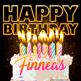 A vibrant animated GIF featuring a delicious birthday cake topped with glowing candles and the name 'Finneas' in elegant script, and the words 'Happy Birthday' on the black background.