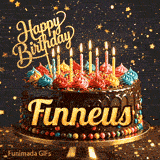 Festive chocolate birthday cake decorated with colorful frosting and candles under sparkling golden stars, personalized for Finneus.