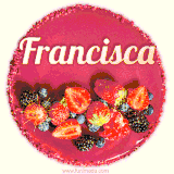 Beautifully decorated red velvet berry birthday cake with vibrant fruits and a glowing 'Francisca' name, adding a touch of sweetness and sparkle.