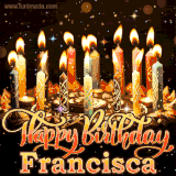 A glowing personalized birthday GIF with name Francisca featuring lit candles with intricate designs, warm lighting, and the text 'Happy Birthday' in an elegant font.