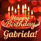 Beautifully decorated red velvet berry birthday cake with vibrant fruits and a glowing 'Gabriela' name, adding a touch of sweetness and sparkle.