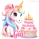 An adorable animated unicorn with soft pastel colors sits beside a birthday cake with glowing candles, and a pink 'Happy Birthday Gia!' words.