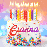 A cheerful white birthday cake with multicolor sprinkles, lit candles, and 'Gianna' written in vibrant letters, in an animated GIF.