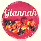 Beautifully decorated red velvet berry birthday cake with vibrant fruits and a glowing 'Giannah' name, adding a touch of sweetness and sparkle.
