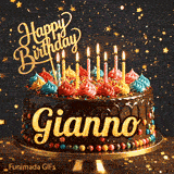 Lit birthday candles on a chocolate drip cake decorated with sprinkles and a gold glitter sign, made for Gianno.