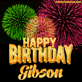 A captivating GIF with bursts of green, pink, and orange fireworks lighting up the night sky, accompanied by 'Happy Birthday Gibson' in glowing golden text.