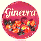 Beautifully decorated red velvet berry birthday cake with vibrant fruits and a glowing 'Ginevra' name, adding a touch of sweetness and sparkle.