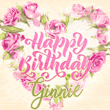 A stunning heart made of pink roses surrounds the elegant script text 'Happy Birthday Ginnie' on a soft beige background. Animated sparkles add a magical and festive feel.