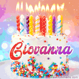 A cheerful white birthday cake with multicolor sprinkles, lit candles, and 'Giovanna' written in vibrant letters, in an animated GIF.