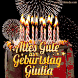 A chocolate birthday cake with glowing candles, the German text 'Alles Gute zum Geburtstag Giulia,' and vibrant fireworks lighting up the background in an animated GIF.