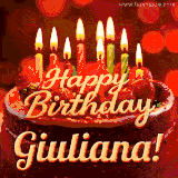 Beautifully decorated red velvet berry birthday cake with vibrant fruits and a glowing 'Giuliana' name, adding a touch of sweetness and sparkle.