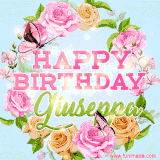A charming animated GIF featuring 'Happy Birthday Giuseppa' in pink and green text, surrounded by delicate roses, leaves, and fluttering butterflies on a soft light blue pastel background.