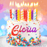 A cheerful white birthday cake with multicolor sprinkles, lit candles, and 'Gloria' written in vibrant letters, in an animated GIF.