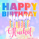 A vibrant animated name GIF with the words 'Happy Birthday Gluckel' with colorful candles on a creamy cake. The background sparkles with pastel shades, adding a festive touch.