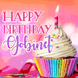 A vibrant birthday GIF featuring a rainbow-colored cupcake topped with white frosting, sprinkles, and a lit candle. The text reads 'Happy Birthday Gobinet' in bold pink and violet letters with white outline.