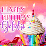 A vibrant birthday GIF featuring a rainbow-colored cupcake topped with white frosting, sprinkles, and a lit candle. The text reads 'Happy Birthday Goldie' in bold pink and violet letters with white outline.
