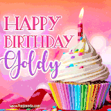 A vibrant birthday GIF featuring a rainbow-colored cupcake topped with white frosting, sprinkles, and a lit candle. The text reads 'Happy Birthday Goldy' in bold pink and violet letters with white outline.