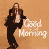 A good morning meme: Estonian artist Tommy Cash, with long white hair and a mustache, does his signature happy dance from the 'Espresso Macchiato' video.