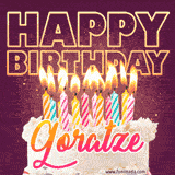 A colorful birthday cake topped with lit candles, with the words 'Happy Birthday Goratze' in bold glowing letters on a burgundy background. Animated flames add a festive touch.