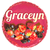 Beautifully decorated red velvet berry birthday cake with vibrant fruits and a glowing 'Graceyn' name, adding a touch of sweetness and sparkle.
