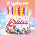 Personalized for Gracie elegant birthday cake adorned with rainbow sprinkles, colorful candles and glitter