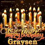 A glowing personalized birthday GIF with name Graysen featuring lit candles with intricate designs, warm lighting, and the text 'Happy Birthday' in an elegant font.